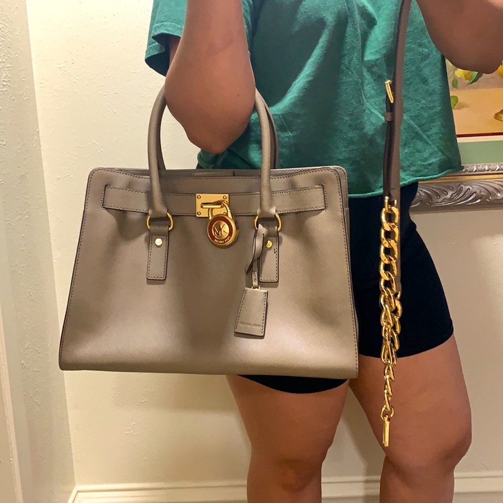 I am selling a grey Michael Kors bag, + body strap - Picture 2 of 2